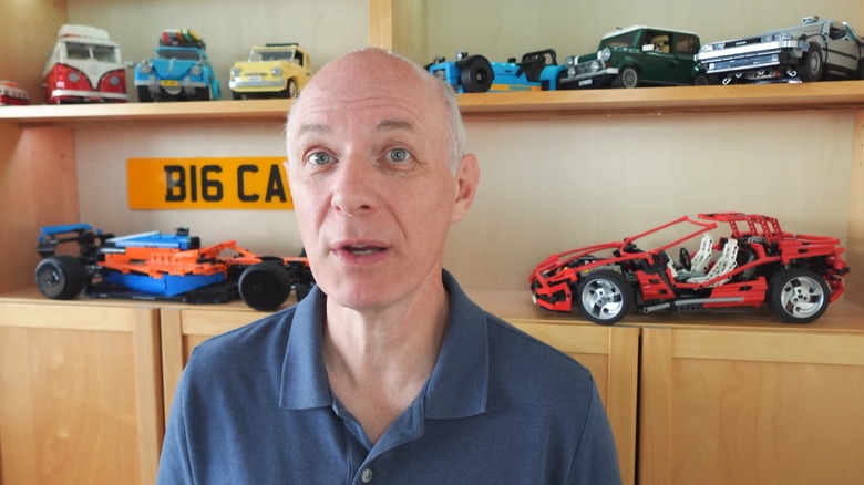 YouTubeer Big Car sitting in front of shelves of model cars