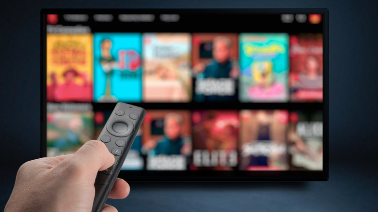 hand controlling remote with TV