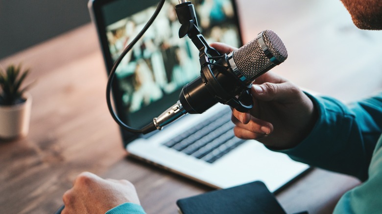 man talking into a microphone