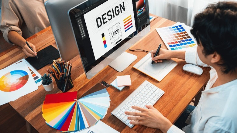 Person using a graphics tablet while designing