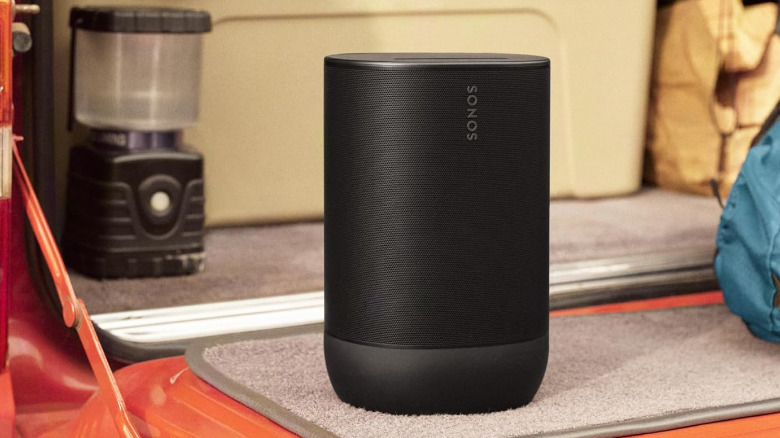 The Sonos Move 2 on a pickup truck bed.