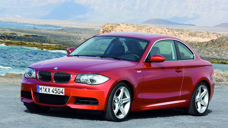 2007 BMW 1-series coupe parked on coastal lot, front-left 3/4 view