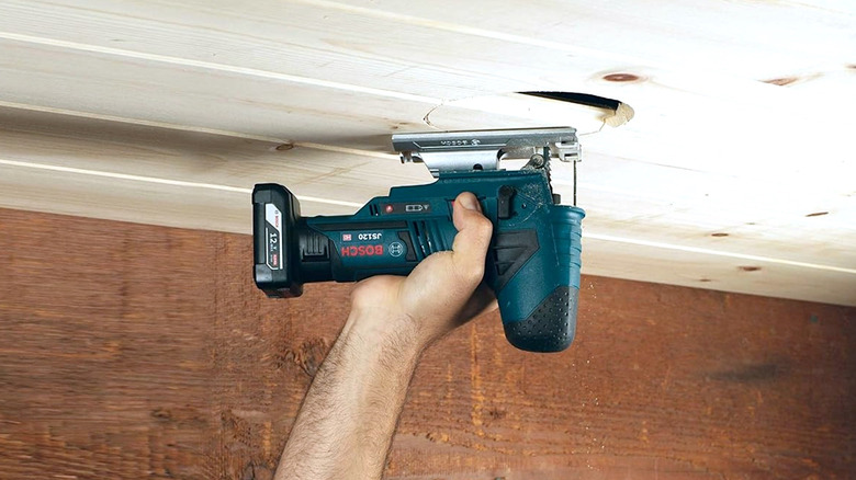 Person using Bosch 12V Max jig saw