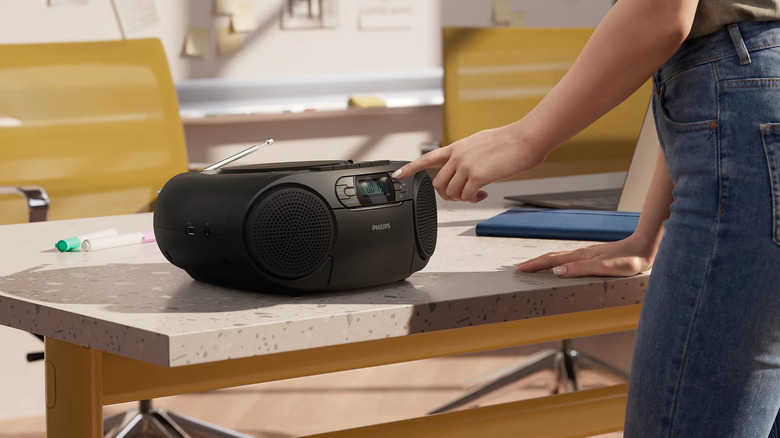 A black Philips CD Soundmachine on a desk.