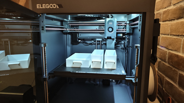 A photograp of an Elegoo Centauri Carbon 3D printer