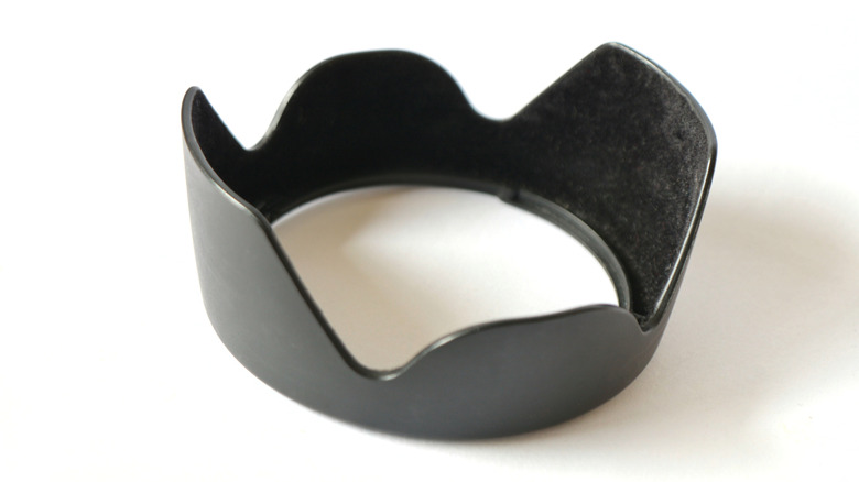 A lens hood on a white background.