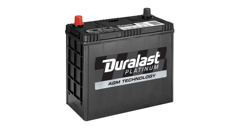 A Duralast Platinum AGM car battery with labeled terminals and a black rectangular casing
