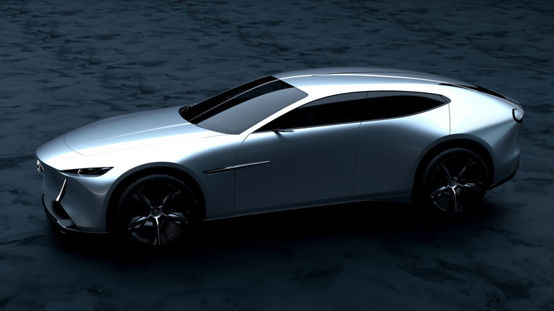 Side view of silver Mazda Vision RX-Coupe Concept.
