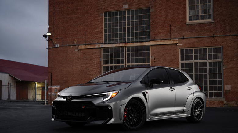2024 Toyota Corolla speeding on a bridge at night