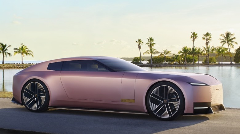Pink Jaguar Type 00 parked at a Miami waterfront