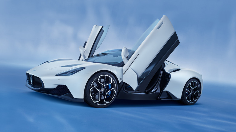 Maserati MC20 with opened scissor doors front 3/4 view