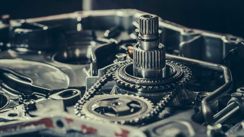 A close up image of a continuously variable transmission gearbox being repaired