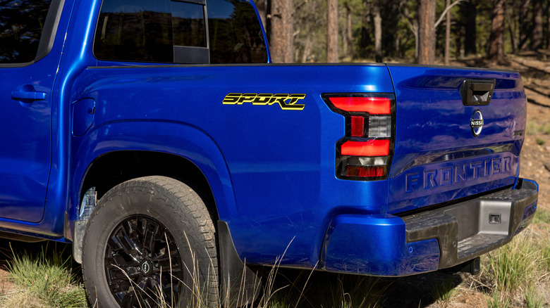 Close up of blue 2027 Nissan Frontier Sport bed.