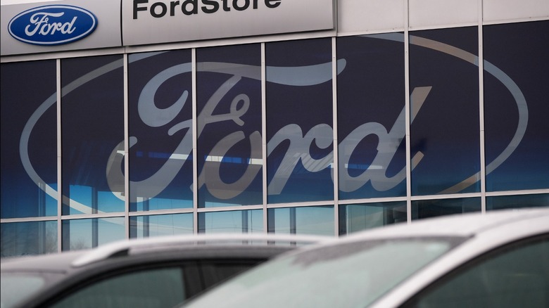 Ford storefront with cars