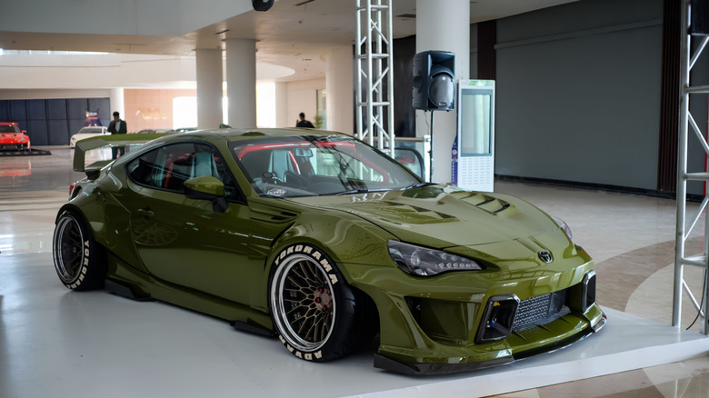 Modified green Toyota 86 front 3/4 view