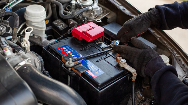 Car battery being replaced