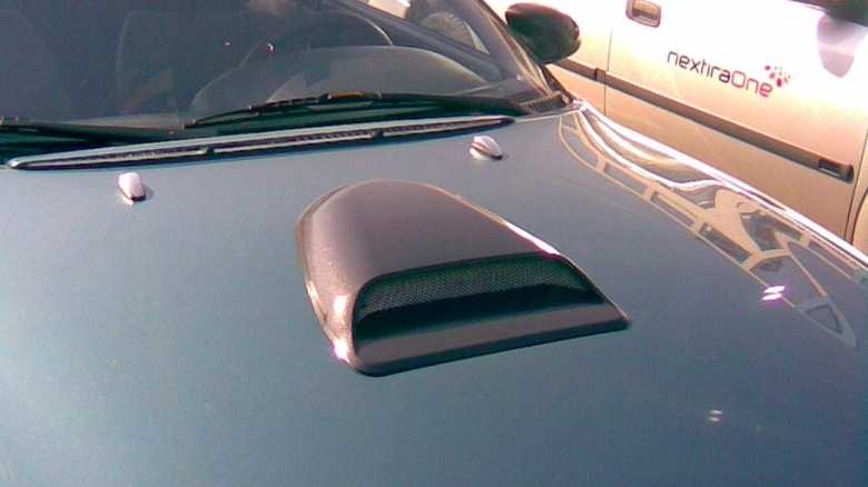 Aftermarket hood scoop on a car