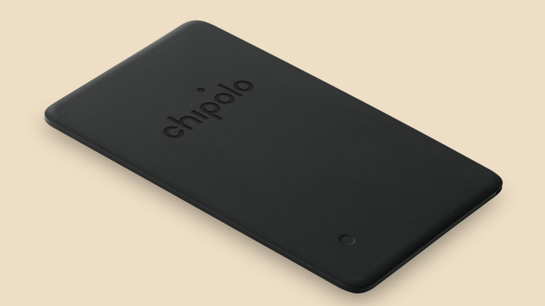 Chipolo CARD Spot card-shaped wallet tracker - a black rectangular device, the size and shape of a credit card, shown at a diagonal angle.