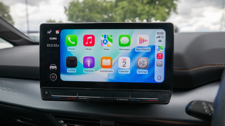 CarPlay screen with colorful background