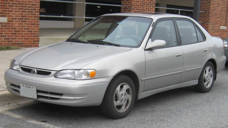 Grey Toyota Corolla parked