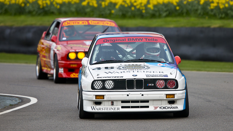 A shot of two BMW M3 E30 racing