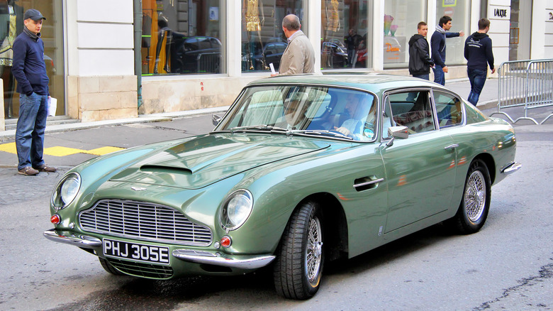 Aston Martin DB6 green driving