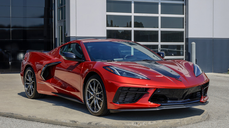 Chevrolet C8 Corvette parked in front of garage, front-right 3/4 view