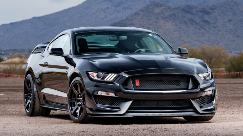 Front view of black 2017 Ford Mustang Shelby GT350R parked in desert.