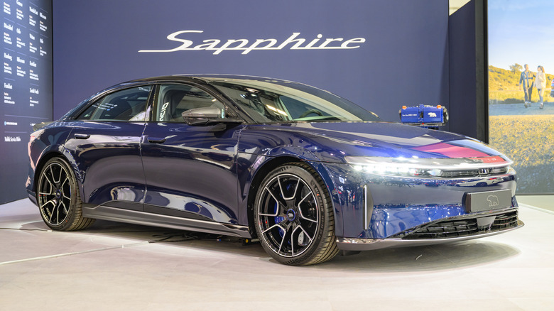 The Lucid Air Sapphire at a car show, front 3/4 view