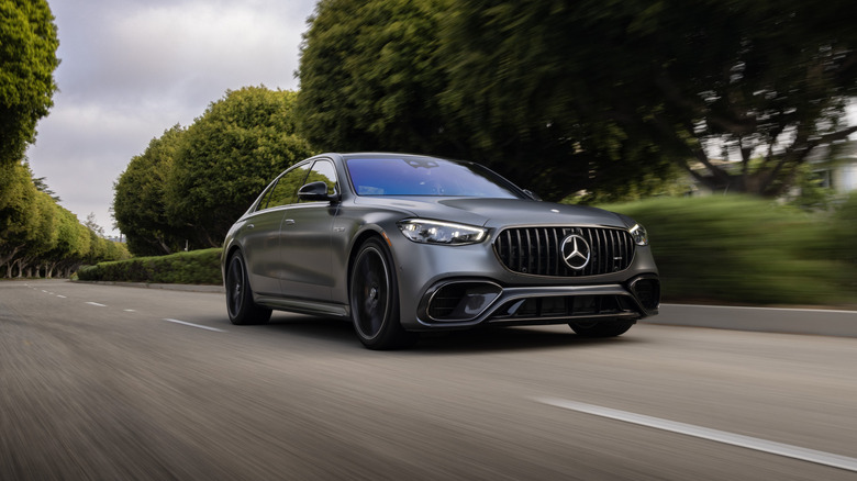 Mercedes-AMG S 63 E Performance seen from front 3/4 angle on the move, matte gray exterior