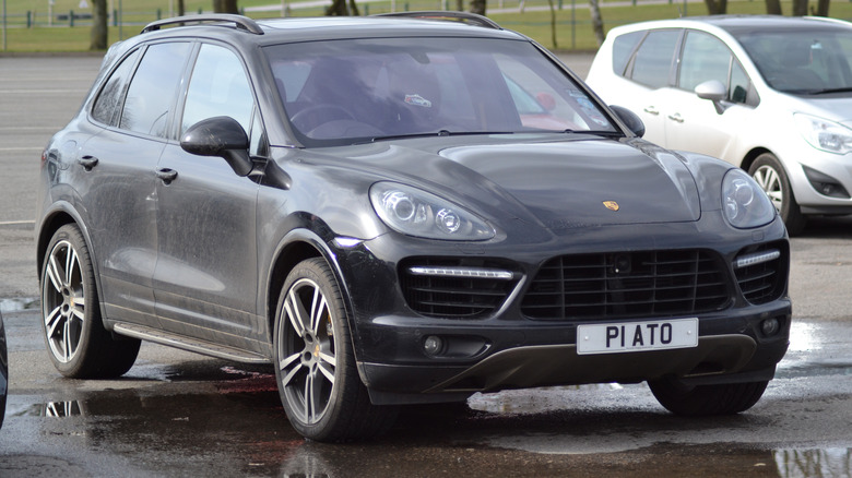 Second-generation Porsche Cayenne parked in lot, front-right 3/4 view