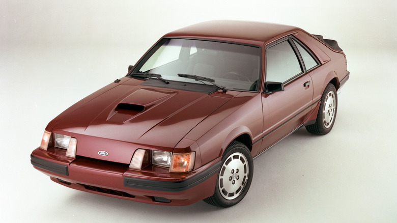 1984 Ford Mustang SVO on isolated white background, front-left 3/4 view
