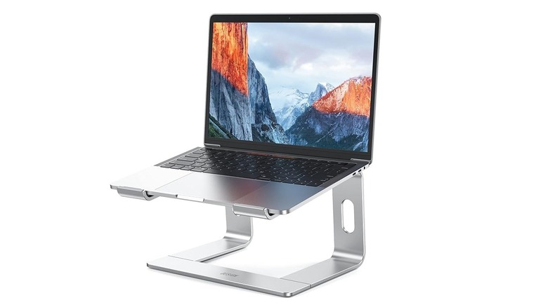 MacBook laptop stand on white background
