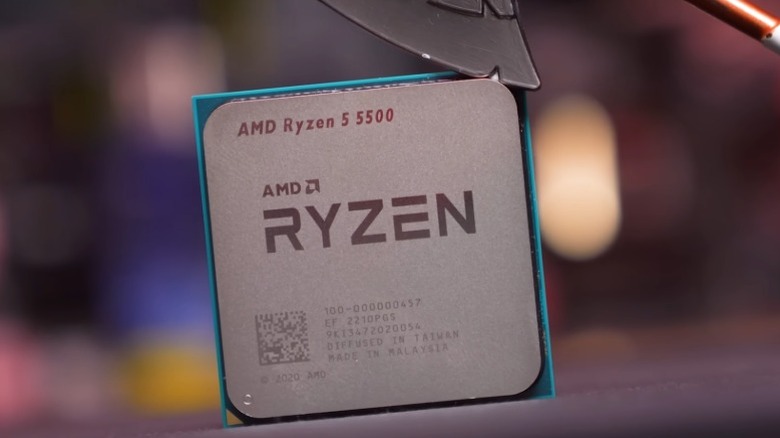 AMD Ryzen 5 5500 CPU with toy axe resting on top