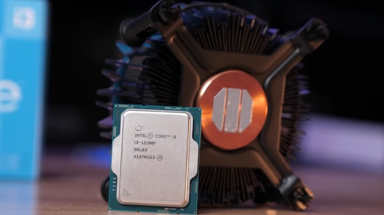 Intel Core i3-12100F CPU resting against CPU cooler