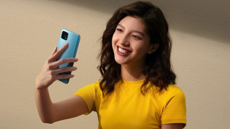 Woman using Oppo A15