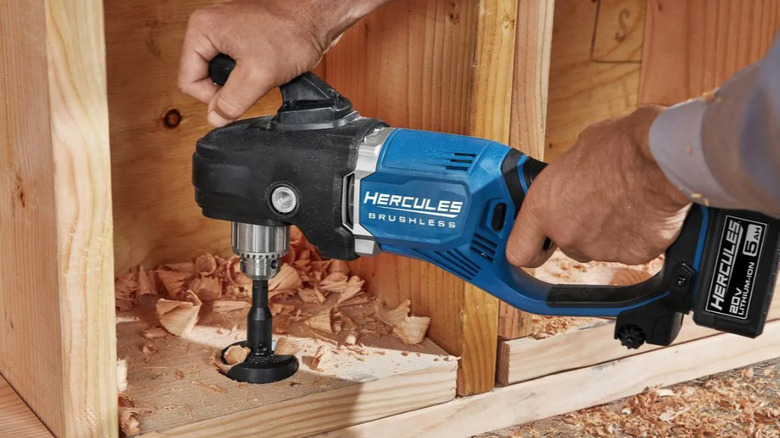 Hercules right angle drill cutting hole into wood