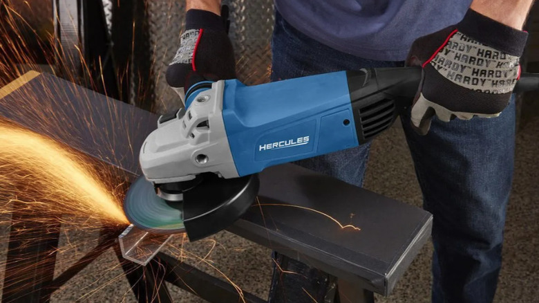 Hercules trigger-grip angle grinder with sparks flying