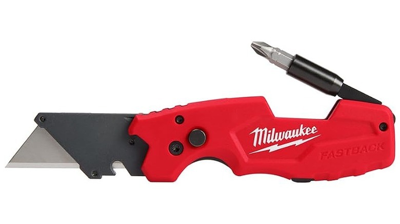 A Milwaukee 6-In-1 Folding Utility Knife with the bit holder out