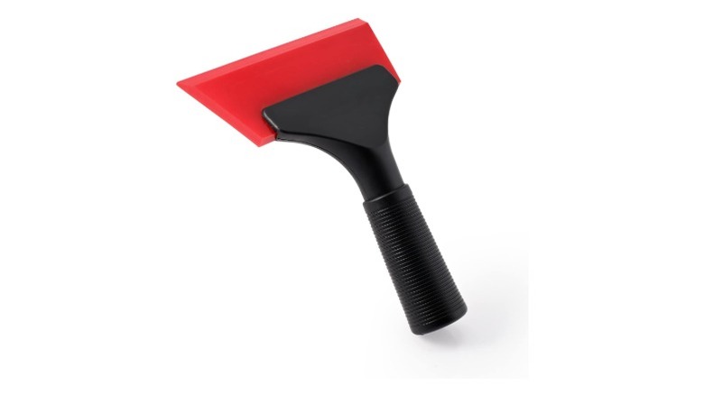 A small handheld squeegee