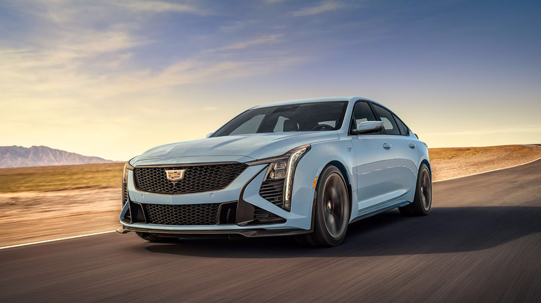 A blue 2026 Cadillac CT5-V Blackwing driving