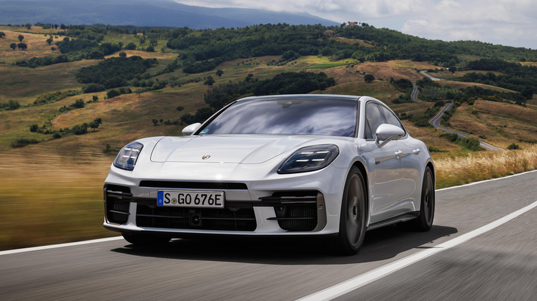 A white 2025 Porsche Panamera driving
