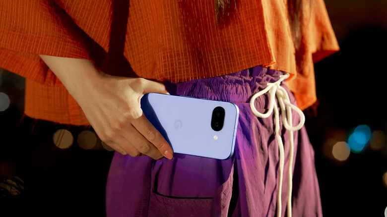Female hand holding a Google Pixel 9a in her hand