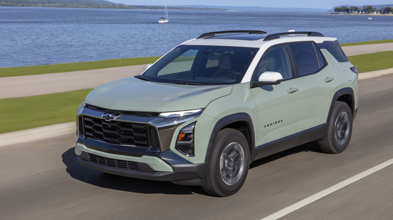 2026 Chevrolet Equinox Activ driving at speed
