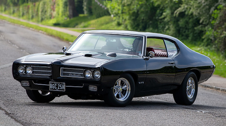 1970 Pontiac GTO parked on street, front-left 3/4 view