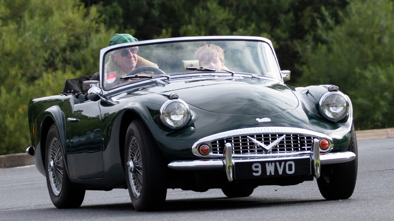 Front 3/4 view of Daimler SP250 driving on road