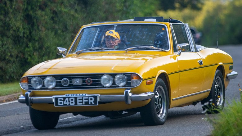 Front 3/4 view of Triumph Stag on the road