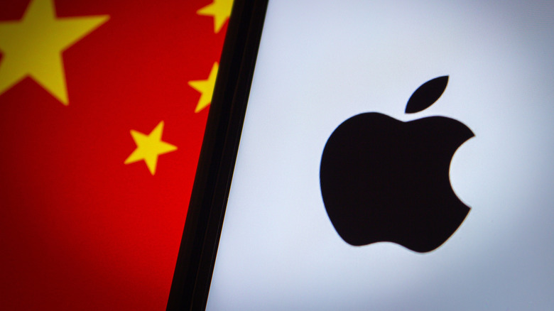 Side by side picture of the Apple Inc. logo and portion of the Chinese flag.