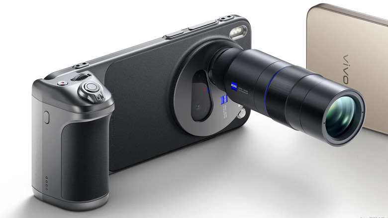 The Vivo X300 Pro with picture camera attachements, including a long telelens.