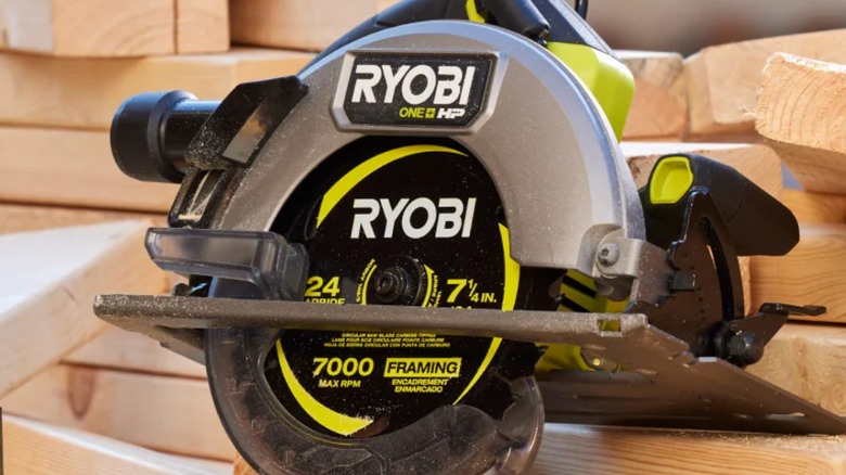 Ryobi One+ HP 18V 7 ½-inch Circular Saw resting on lumber